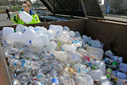 In this March 12, 2018, file photo, Skagit County Solid Waste Division manager Margo Gillaspy displays some of the recyclable plastic items that had been deposited at the Skagit County Transfer Station at Ovenell Road in Mt. Vernon, Wash. Image credit: Scott Terrell/Skagit Valley Herald via AP, File