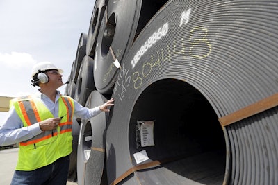 CEO Joel Johnson checks the details on a roll of steel at the Borusan Mannesmann Pipe manufacturing facility Tuesday, June 5, 2018, in Baytown, Texas.Image credit: AP Photo/David J. Phillip