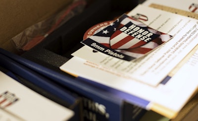 In this April 25, 2018, photo, literature is on display on the factory floor of Honor Defense, a gunmaker in Gainesville, Ga.Image credit: AP Photo/Lisa Marie Pane