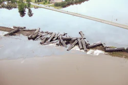 In this aerial drone image taken from video and provided by the Sioux County Sheriff's Office, tanker cars carrying crude oil are shown derailed about a mile south of Doon, Iowa, Friday, June 22, 2018. Image credit: (Sioux County Sheriff's Office via AP