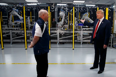 President Donald Trump tours a Foxconn facility, Thursday, June 28, 2018, in Mt. Pleasant, Wis. Image credit: AP Photo/Evan Vucci