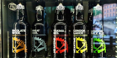 A selection of mainly British beers are seen for sale in a Wetherspoon pub in North London, Wednesday, June 13, 2018. A major U.K. pub chain will stop serving French Champagne and German wheat beers next month and offer more British drinks to prepare for the country's departure from the European Union. Tim Martin, the founder of the JD Wetherspoon chain and a strong advocate for Brexit, says the aim is to make the business more competitive for when Brexit becomes a reality. (AP Photo/Robert Stevens)
