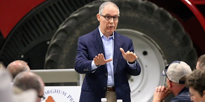 Environmental Protection Agency Administrator Scott Pruitt addresses farmers during a forum at a farm near Reliance, S.D. Farmers and ethanol producers gave Pruitt a rough reception in South Dakota, accusing him of undermining the industry that's a key part of the state's economy. (Ellen Bardash/The Daily Republic via AP)