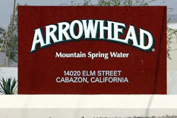 FILE - In this July, 7, 2004, file photo, a sign at the entrance to the Arrowhead Mountain Spring Water Company bottling plant, owned by Swiss conglomerate Nestle, on the Morongo Indian Reservation near Cabazon, Calif. Nestle has been offered a three-year permit to keep taking millions of gallons of water from Southern California's San Bernardino National Forest, but with new restrictions designed to keep a creek flowing for other uses. The offer announced Wednesday, June 27, 2018, by the U.S. Forest Service allows the maker of Arrowhead bottled water to continue piping water from the Strawberry Creek watershed as it has done for decades. (AP Photo/Damian Dovarganes, File)