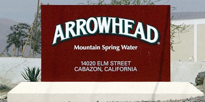 FILE - In this July, 7, 2004, file photo, a sign at the entrance to the Arrowhead Mountain Spring Water Company bottling plant, owned by Swiss conglomerate Nestle, on the Morongo Indian Reservation near Cabazon, Calif. Nestle has been offered a three-year permit to keep taking millions of gallons of water from Southern California's San Bernardino National Forest, but with new restrictions designed to keep a creek flowing for other uses. The offer announced Wednesday, June 27, 2018, by the U.S. Forest Service allows the maker of Arrowhead bottled water to continue piping water from the Strawberry Creek watershed as it has done for decades. (AP Photo/Damian Dovarganes, File)