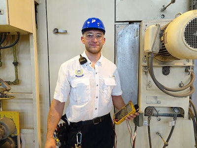 Timothy Gutierrez, an electrician at Inteplast BOPP Films, Lolita, TX, inspects a TDO heating system.