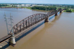 In this photo made Wednesday, June 27, 2018, the Merchants Bridge is seen in the foreground as it crosses the Mississippi River as the St. Louis skyline is seen in the distance. Image credit: AP Photo/Jeff Roberson