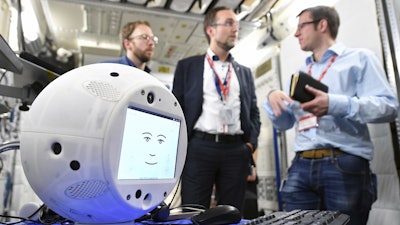 This Jan. 30, 2018 photo provided by the German Aerospace Center shows the 'Cimon' (Crew Interactive MObile companioN) robot during a communications test at the ESA European Astronaut Center in Cologne-Porz, Germany. Image credit: T. Bourry/ESA/DLR via AP