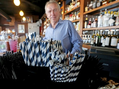 In this June 19, 2018 photo, paper straws sit at Duke Moscrip, owner of Duke's Restaurants, bar at his restaurant in Seattle. Image credit: Greg Gilbert/The Seattle Times via AP