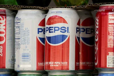 In this May 7, 2018, file photo, cans of Pepsi are displayed in New York. PepsiCo Inc. reports earns on Tuesday, July 10. Image credit: AP Photo/Mark Lennihan, File