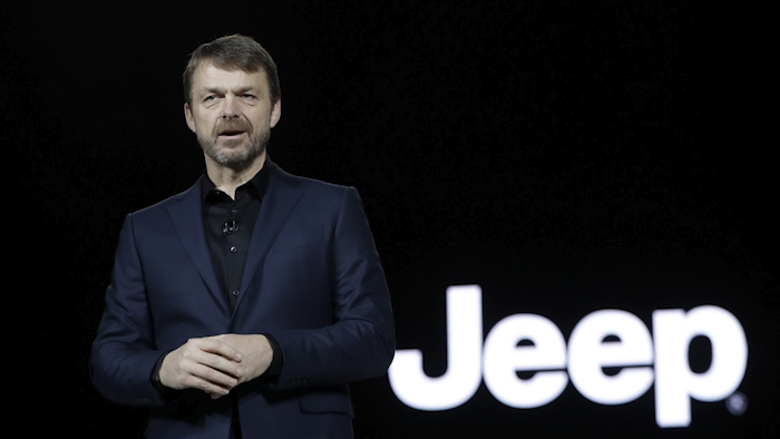 In this file photo dated Tuesday, Jan. 16, 2018, Mike Manley, head of Jeep Brand, introduces the 2019 Jeep Cherokee during the North American International Auto Show, in Detroit, USA. Image credit: AP Photo/Carlos Osorio, FILE