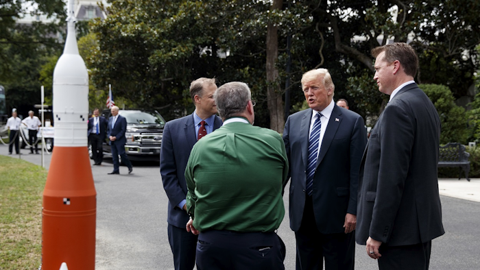 President Donald Trump participates in a tour during a 'Made in America Product Showcase' at the White House, Monday, July 23, 2018, in Washington. Image credit: AP Photo/Evan Vucci