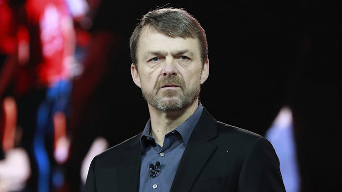 In this file photo dated Monday, Jan. 15, 2018, Mike Manley, head of Jeep brand, addresses the media during the North American International Auto Show, in Detroit, USA. Image credit: AP Photo/Carlos Osorio