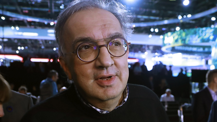 In this Tuesday, Jan. 16, 2018 filer, Fiat Chrysler Automobiles CEO Sergio Marchionne is interviewed after the unveiling of the new 2019 Jeep Cherokee during the North American International Auto Show, in Detroit. Image credit: AP Photo/Carlos Osorio, File