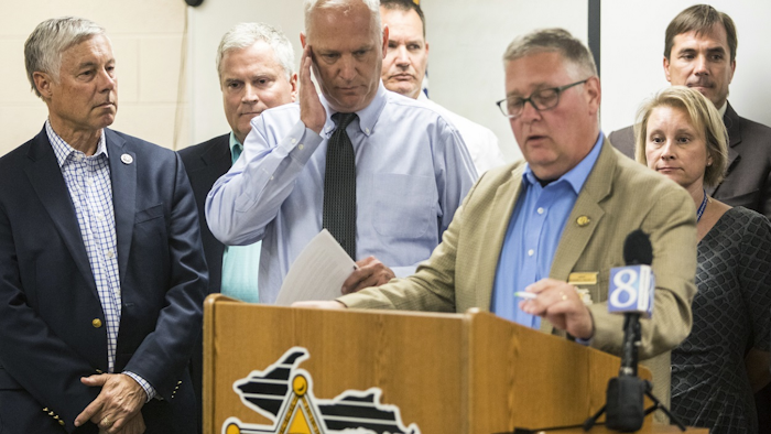 Kalamazoo County Sheriff Richard Fuller speaks during a press conference about the high levels of Perfluoroalkyl and polyfluoroalkyl substances, PFAS, found in the drinking water of Parchment and Cooper Township at the Emergency Management Office inside the Kalamazoo County Sheriff Department in Kalamazoo, Michigan on Thursday, July 26, 2018. Image credit: Daniel Vasta /Kalamazoo Gazette via AP