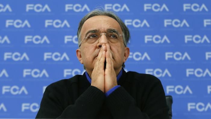 In this Monday, Jan. 12, 2015, file photo, Fiat Chrysler Automobiles CEO Sergio Marchionne speaks at media previews for the North American International Auto Show in Detroit. Image credit: AP Photo/Paul Sancya, File
