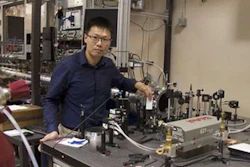 Researchers at Stanford University have developed a novel method for measuring hydroxyl radical (OH), a critical molecule in combustion reactions, with record-breaking sensitivity. This method uses frequency-modulation of ultraviolet light to eliminate noise that hindered conventional methods from accurately detecting trace amount of OH in combustion environments and paves a pathway to new regimes of combustion research that were previously not accessible. Here, Shengkai Wang is aligning the UV laser beam through the combustion reactor. (Optical Society of America)