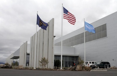 This April 15, 2011 file photo shows a data center for Facebook in Prineville, Ore. Facebook and Pacific Power are teaming up to construct solar projects that will produce enough power to offset what the social media giant consumes at its data centers in Prineville. The companies along with Oregon Gov. Kate Brown announced the deal Wednesday, July 18, 2018. (Faith Cathcart/The Oregonian via AP)