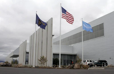 This April 15, 2011 file photo shows a data center for Facebook in Prineville, Ore. Facebook and Pacific Power are teaming up to construct solar projects that will produce enough power to offset what the social media giant consumes at its data centers in Prineville. The companies along with Oregon Gov. Kate Brown announced the deal Wednesday, July 18, 2018. (Faith Cathcart/The Oregonian via AP)