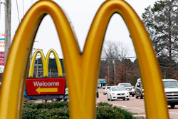 FILE - This Feb. 15, 2018, file photo shows a McDonald's Restaurant in Brandon, Miss. Seven national fast-food chains have agreed to end policies that block workers from changing branches, limiting their wages and job opportunities, under the threat of legal action from the state of Washington. Washington Attorney General Bob Ferguson announced the binding agreements with companies including Arby’s, Jimmy John’s and Cinnabon, at a news conference Thursday, July 12, 2018. McDonald's also signed on, but previously announced plans to end the practice. (AP Photo/Rogelio V. Solis, File)