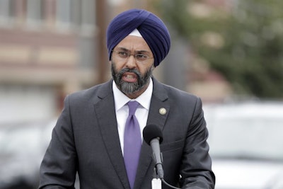 New Jersey Attorney General Gurbir Grewal speaks during a news conference announcing pollution lawsuits filed by the state, Wednesday, Aug. 1, 2018, in Newark, N.J. Grewal said it's the largest single-day action the state has taken in at least a decade and the first new natural resources damages case since 2008. He said he didn't have an estimate for what the state might recover financially but said the cases could take a long time to prosecute. The cases include two sites in Newark, two in Woodbridge and one each in Atlantic City and Warren County. (AP Photo/Julio Cortez)