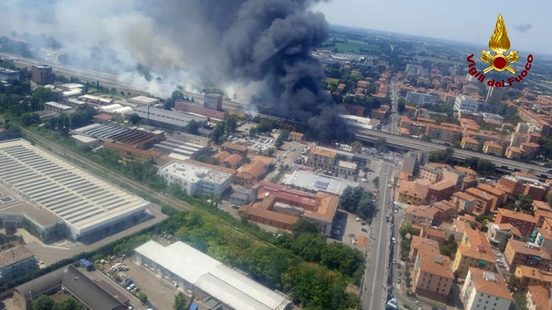 In this photo released by the Italian firefighters, an helicopter view of the explosion on a highway in the outskirts of Bologna, Italy, Monday, Aug. 6, 2018. The explosion was reportedly caused by an accident involving a truck that was transporting flammable substances and exploded upon impact. (Vigili Del Fuoco via AP)