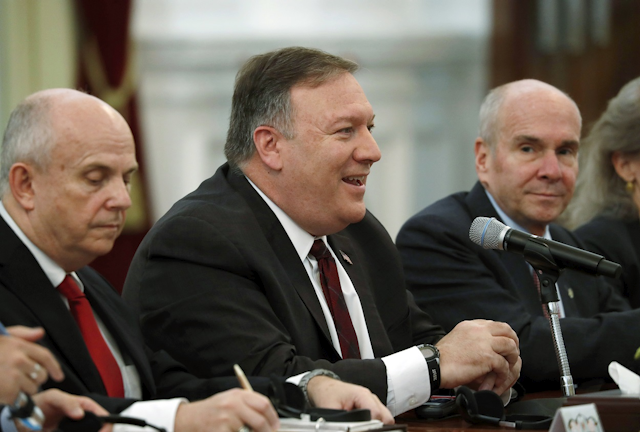 U.S. Secretary of State Mike Pompeo, center, talks with Indonesian President Joko Widodo, unseen, during their meeting at Merdeka palace in Jakarta, Indonesia, Sunday, Aug. 5, 2018. Image credit: Beawiharta/Pool Photo via AP