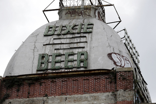 This Wednesday, July 3, 2013 file photo shows the top of the abandoned Dixie Beer brewery on Tulane Avenue in New Orleans. Image credit: AP Photo/Gerald Herbert