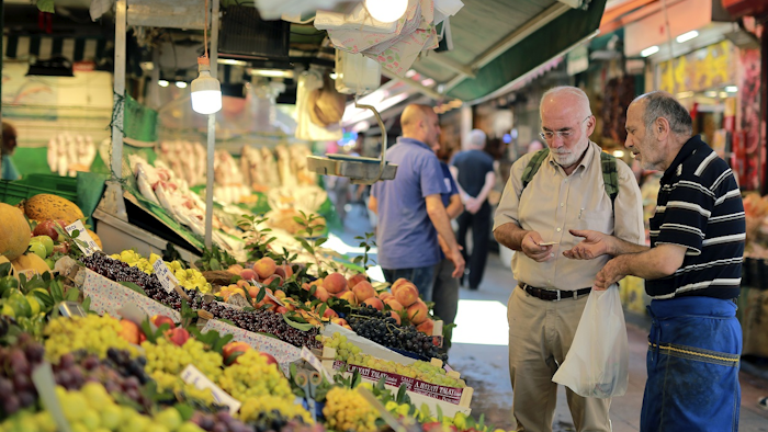 A man shops in a market in Istanbul, Monday, Aug. 13, 2018. Image credit: AP Photo/Mucahid Yapici