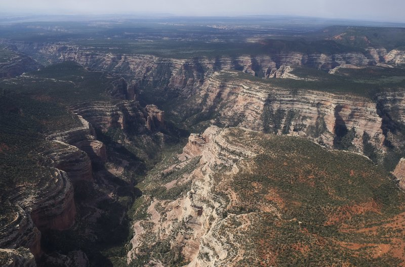 This Dec. 28, 2016, file photo shows the two buttes that make up the namesake for Utah's Bears Ears National Monument in southeastern Utah. The U.S. government is issuing draft proposals for how it would like to manage two national monuments in Utah that were significantly downsized by President Donald Trump in 2017 in a move that angered conservation and tribal groups and triggered lawsuits. (Francisco Kjolseth/The Salt Lake Tribune via AP)