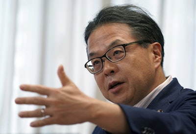 Japan’s Trade Minister Hiroshige Seko speaks during an exclusive interview with The Associated Press at his office in Tokyo Thursday, Aug. 23, 2018. Image credit: AP Photo/Eugene Hoshiko