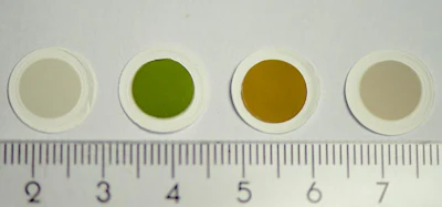 Samples of the colorful carbon nanotube thin films, as produced in the fabrication reactor. (Aalto University)