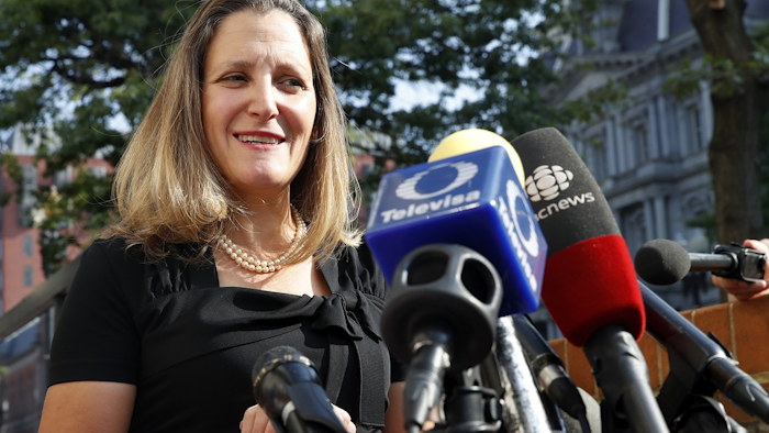 Canada's Foreign Affairs Minister Chrystia Freeland speaks to the media as she arrives to the Office of the United States Trade Representative to continue talks on trade, Wednesday, Aug. 29, 2018, in Washington. Image credit: AP Photo/Jacquelyn Martin