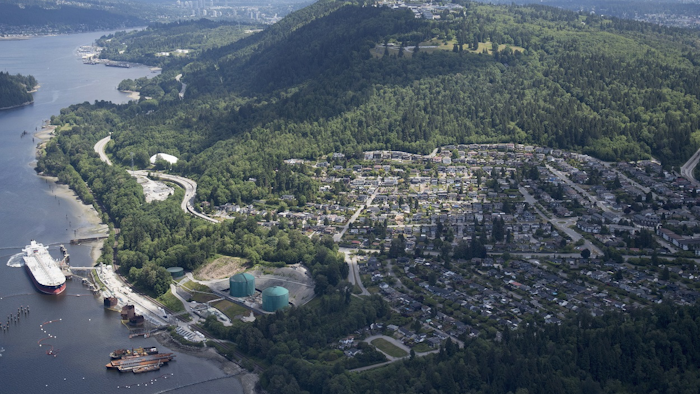 This May 29, 2018, file photo, shows Kinder Morgan's Trans Mountain marine terminal in Burnaby, British Columbia. Image credit: Jonathan Hayward/The Canadian Press via AP, File