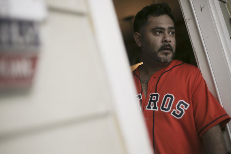 In this Jan. 24, 2018, photo, Juan Sierra poses for a photo in Houston. Sierra says he and other residents got no information about a major gasoline spill from large storage tanks that the state says lasted for 12 days and released more than 2 million pounds (0.91 million kilograms) of air pollution at the nearby Galena Park terminal. (Elizabeth Conley/Houston Chronicle via AP)