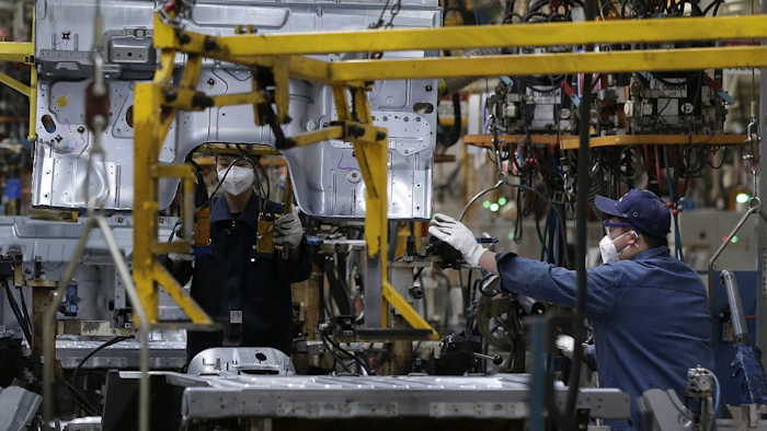 Workers assemble the BAIC Jeep chassis frames at the Chinese automaker BAIC ORU assembly plant in Beijing, Wednesday, Aug. 29, 2018. Image credit: AP Photo/Andy Wong