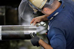In this June 5, 2018, file photo Erik Cordova inspects a steel pipe at the Borusan Mannesmann Pipe manufacturing facility Tuesday, June 5, 2018, in Baytown, Texas. Image credit: AP Photo/David J. Phillip, File