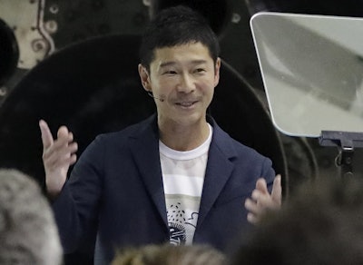 Japanese billionaire Yusaku Maezawa speaks after SpaceX founder and chief executive Elon Musk announced him as the person who would be the first private passenger on a trip around the moon, Monday, Sept. 17, 2018, in Hawthorne, Calif. Image credit: AP Photo/Chris Carlson