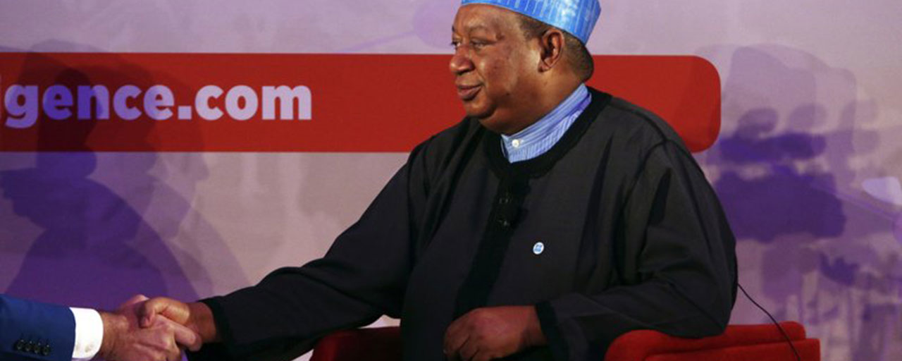 OPEC Secretary-General Mohammed Sanusi Barkindo shakes hands with a moderator after an event in Fujairah, United Arab Emirates, Tuesday, Sept. 18, 2018. The head of OPEC said that the oil cartel must stick together for the good of the global economy amid Iran facing renewed U.S. sanctions. (AP Photo/Jon Gambrell)