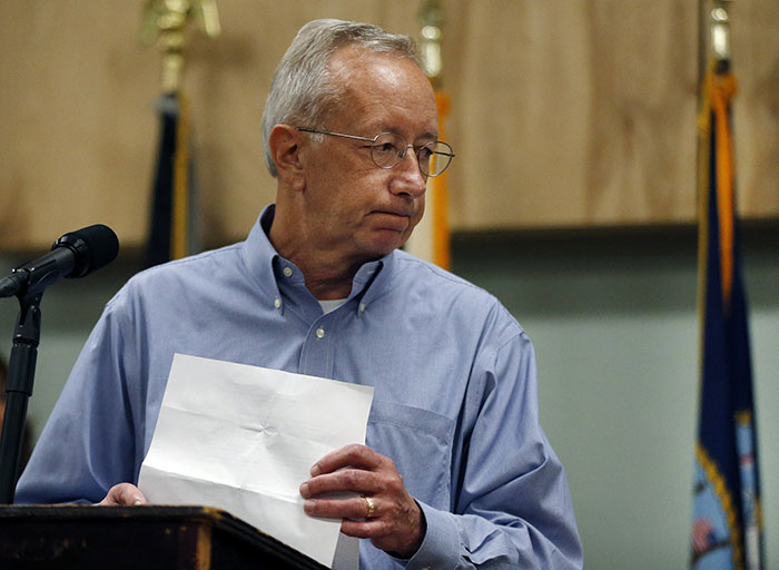 Columbia Gas CEO Steve Bryant finishes his remarks at a news conference in Lawrence, Mass., Tuesday, Sept. 18, 2018, regarding last week's gas explosions and house fires in the Merrimack Valley. Bryant announced that the utility is donating $10 million to an emergency relief fund for people affected by the emergency. (AP Photo/Elise Amendola)
