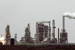 This April 2, 2010 file photo shows a refinery owned by Andeavor, formerly Tesoro Corp. including a gas flare flame that is part of normal plant operations, in Anacortes, Wash. Image credit: AP Photo/Ted S. Warren, File