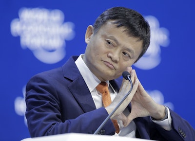 In this Wednesday, Jan. 24, 2018 file photo, Alibaba founder Jack Ma listens during a session of the annual meeting of the World Economic Forum in Davos, Switzerland. Image credit: AP Photo/Markus Schreiber