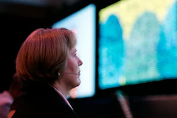 In this Sept. 11, 2007 file photo Diane Greene, CEO of VMware Inc. waits to be introduced before delivering her keynote address at the VMWorld 2007 conference in San Francisco. Image credit: AP Photo/Eric Risberg, File