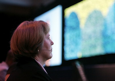 In this Sept. 11, 2007 file photo Diane Greene, CEO of VMware Inc. waits to be introduced before delivering her keynote address at the VMWorld 2007 conference in San Francisco. Image credit: AP Photo/Eric Risberg, File