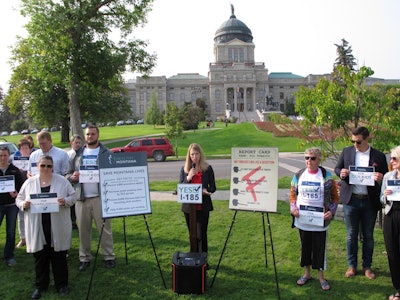 In this Aug. 22, 2018, file photo, Amanda Cahill of the American Heart Association speaks to a rally in support of a ballot initiative to raise Montana's tobacco taxes in Helena, Mont. Image credit: AP Photo/Matt Volz, file
