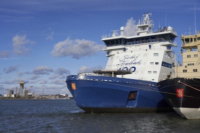 In this photo taken taken Thursday Sept. 27, 2018, the Finnish icebreaker Polaris is moored in Helsinki after an oil spill response drill testing an in-built recovery system, a first for an icebreaker. The vessel can collect 1,400 cubic meters (49,000 cubic feet) of oil, even in harsh and icy weather conditions. (AP Photo/David Keyton)