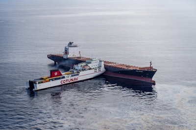 In this photo provided Monday Oct.8, 2018 by the Marine Nationale, a Tunisian ship and a Cypriot ship are seen after a collision in the Mediterranean Sea north of Corsica island, Sunday, Oct. 7, 2018. Two merchant ships collided north of the French island of Corsica on Sunday, causing a 4-kilometer (2.4 mile) fuel spill in the Mediterranean Sea that French and Italian authorities are working to contain. (Benoit Emile/Marine Nationale via AP)