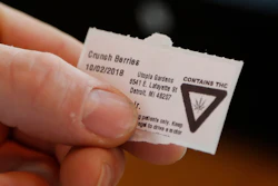 In this Tuesday, Oct. 2, 2018, photo, a warning label from Utopia Gardens, a medical marijuana dispensary, is shown in Detroit. Image credit: AP Photo/Carlos Osorio