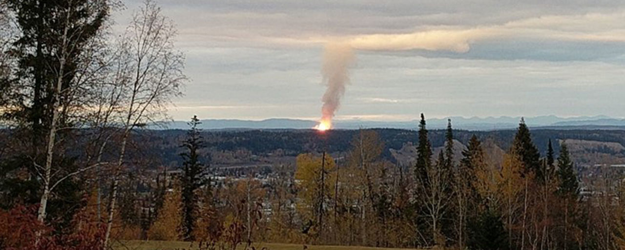 This Tuesday, Oct. 9, 2018, photo provided by Dhruv Desai shows an explosion near the community of Shelley, British Columbia. The massive pipeline explosion risks cutting off the flow of Canadian natural gas to Washington State, and companies are urging customers to conserve. (Dhruv Desai via AP)