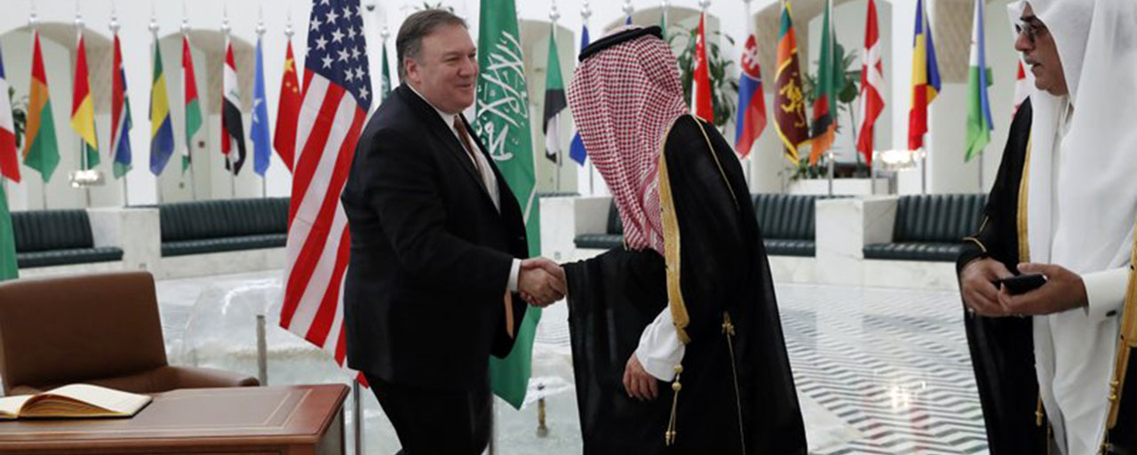 U.S. Secretary of State Mike Pompeo, center, walks with Saudi Foreign Minister Adel al-Jubeir in Riyadh, Saudi Arabia, Tuesday Oct. 16, 2018. U.S. Secretary of State Mike Pompeo met on Tuesday with Saudi Arabia's King Salman over the disappearance and alleged slaying of Saudi writer Jamal Khashoggi, who vanished two weeks ago during a visit to the Saudi Consulate in Istanbul. (Leah Millis/Pool via AP)